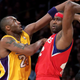 A photo of Elton Brand and some guy, via Getty